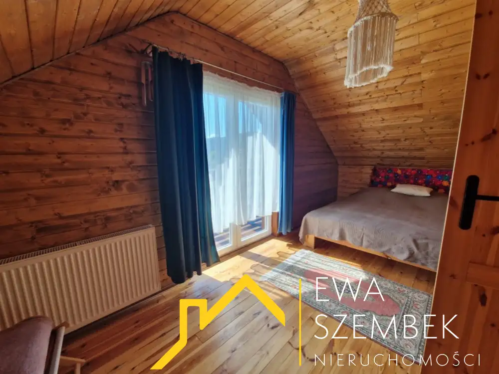 Drewniany dom o powierzchni całkowitej 66,70m2, użytkowej 50,40m2, działka 2000m2 - Dom w górach na sprzedaż