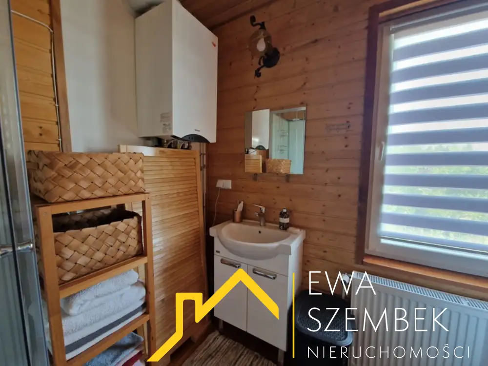 Drewniany dom o powierzchni całkowitej 66,70m2, użytkowej 50,40m2, działka 2000m2 - Dom w górach na sprzedaż