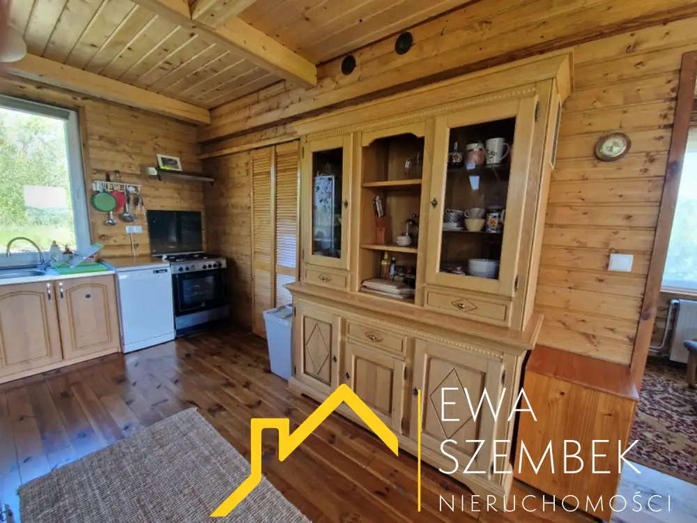 Drewniany dom o powierzchni całkowitej 66,70m2, użytkowej 50,40m2, działka 2000m2 - Dom w górach na sprzedaż