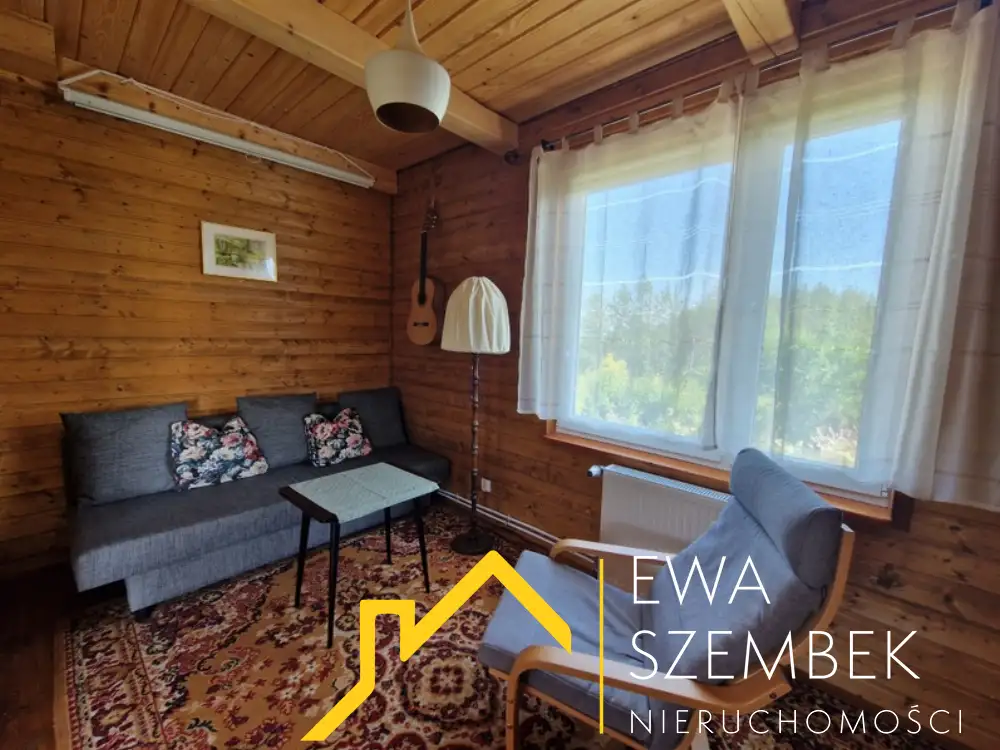 Drewniany dom o powierzchni całkowitej 66,70m2, użytkowej 50,40m2, działka 2000m2 - Dom w górach na sprzedaż